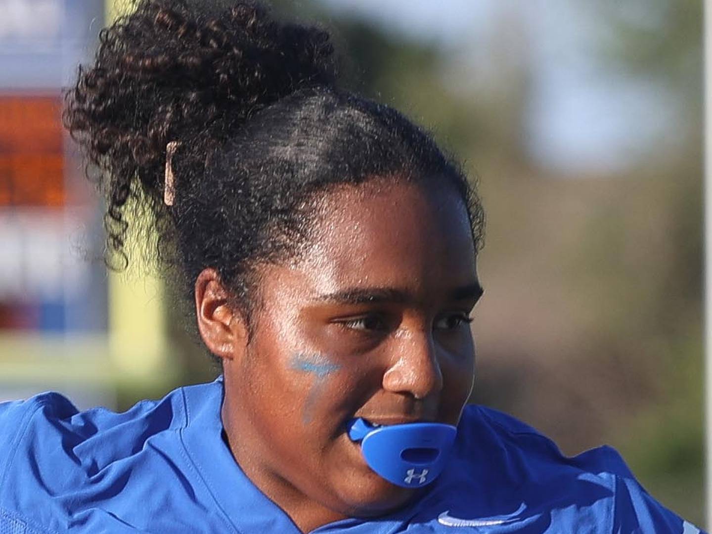 Joliet Central’s Georgianna Majerus breaks away for the programs first touchdown in their inaugural flag football game against Brady-Bourbonnais on Thursday, August 29, 2024 in Joliet.