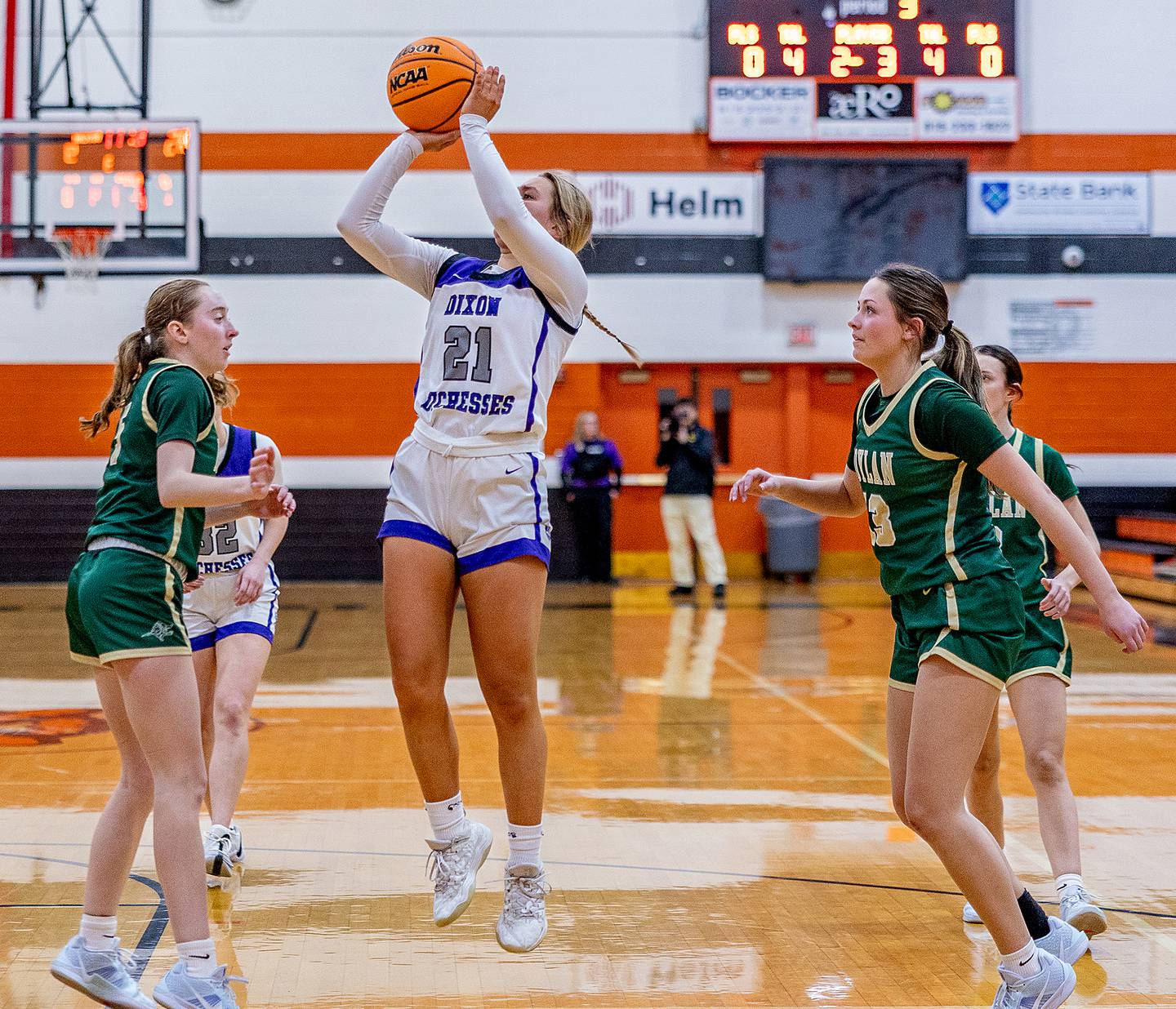 Dixon junior Reese Dambman pulls up for a jump shot during the third quarter of action at Freeport High School. Dixon won 50-20 and will advance to the Rockford Boylan sectional.