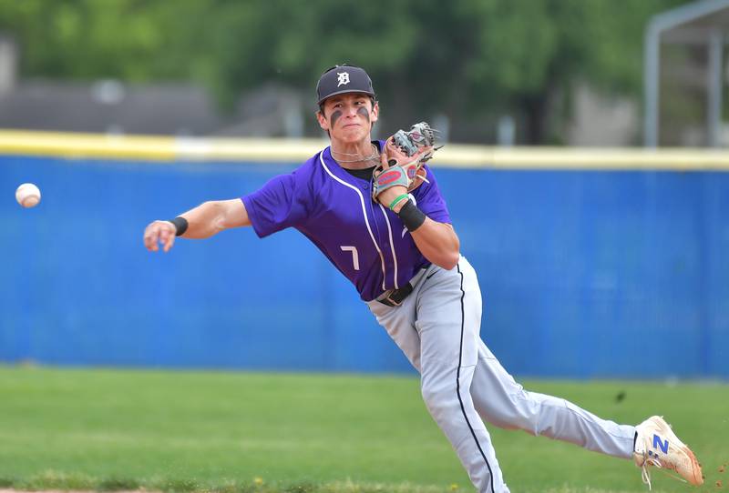Downers Grove North shortstop Emilio Gandarilla throws out a Lyons Township hitter during a game on May 18, 2026 at Lyons Township High School in LaGrange.