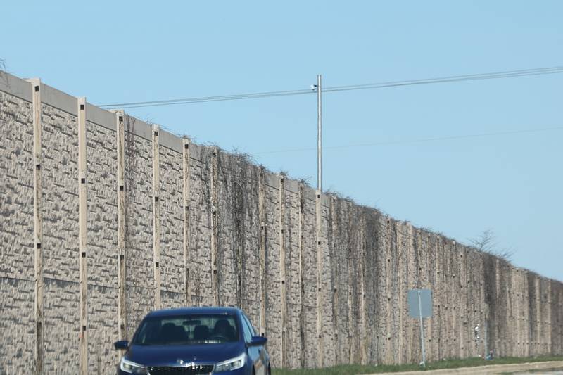 A sound barrier wall stands between Interstate 55 and NE Frontate Road on Wednesday, March 20, 2024 in Joliet.