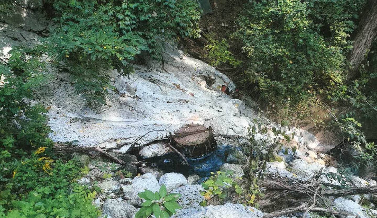 A photo of concrete debris in the ravine near La Salle Peru High School in September 2021