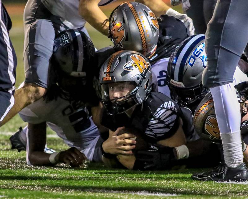 Minooka's Gavin Dooley (11) after converting a huge first down late in the game against Oswego East.  Sept 30, 2022