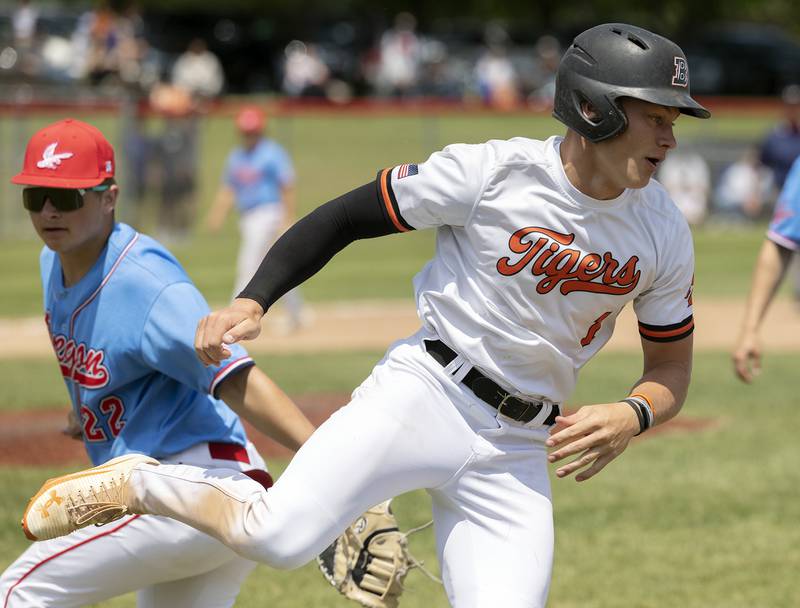 Byron’s Brayden Knoll spins to avoid a tag by Oregon’s Kade Girton Saturday, May 24, 2025, in the Stillman Valley Class 2A regional final.