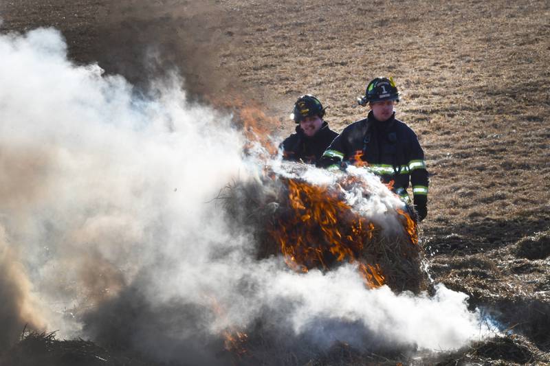 Firefighters from several departments responded to a field and hay bale fire at a farm on West Pines Road between Polo and Oregon on Monday, Feb. 23, 2026.