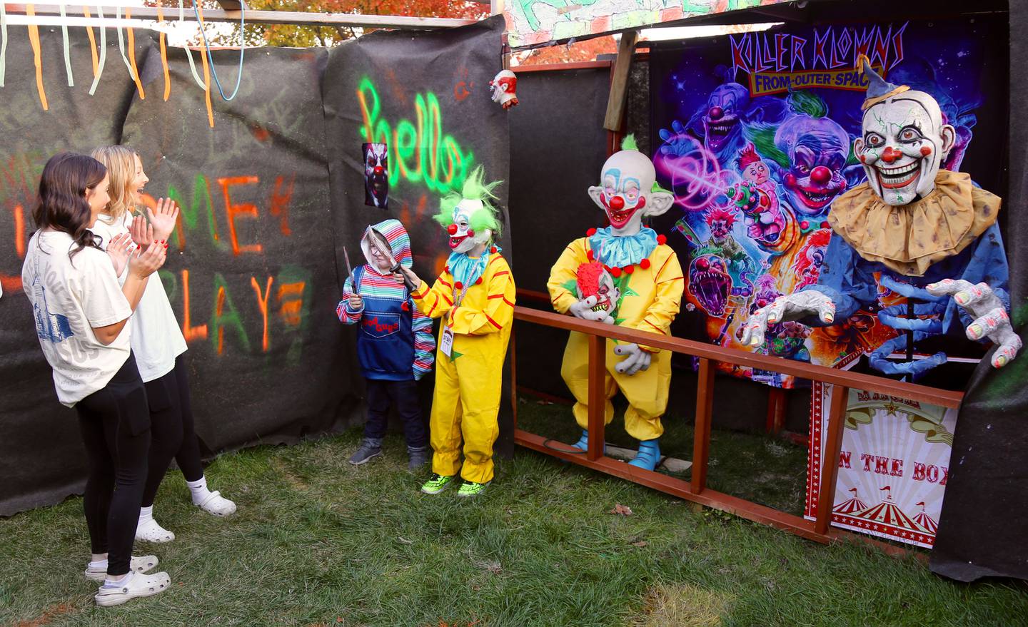 (Left to right) Hadley Gilbertson and Addison Klein meet some Killer Klowns in the Kamme-O-Circus Halloween Haunted House on Saturday, Oct. 19, 2024 in Elburn.