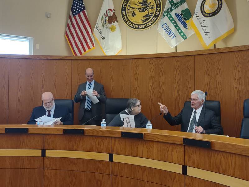 A newly appointed Crystal Lake Municipal Officers Electoral Board upheld the candidacy of Brett Hopkins to run for re-election to city council in the April election during a hearing on Wednesday, Jan. 25, 2023. From left to right: electoral board member Patrick Walsh, electoral board attorney Ken Florey, electoral board member Cathy Ferguson, and electoral board chairman Michael McNerney.