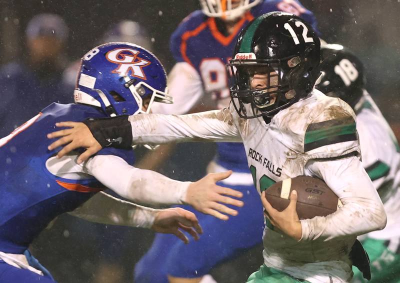 Rock Falls' Austin Castaneda tries to get by Genoa-Kingston's Nathan Kleba during their game Friday, Oct. 13, 2023, at Genoa-Kingston High School.