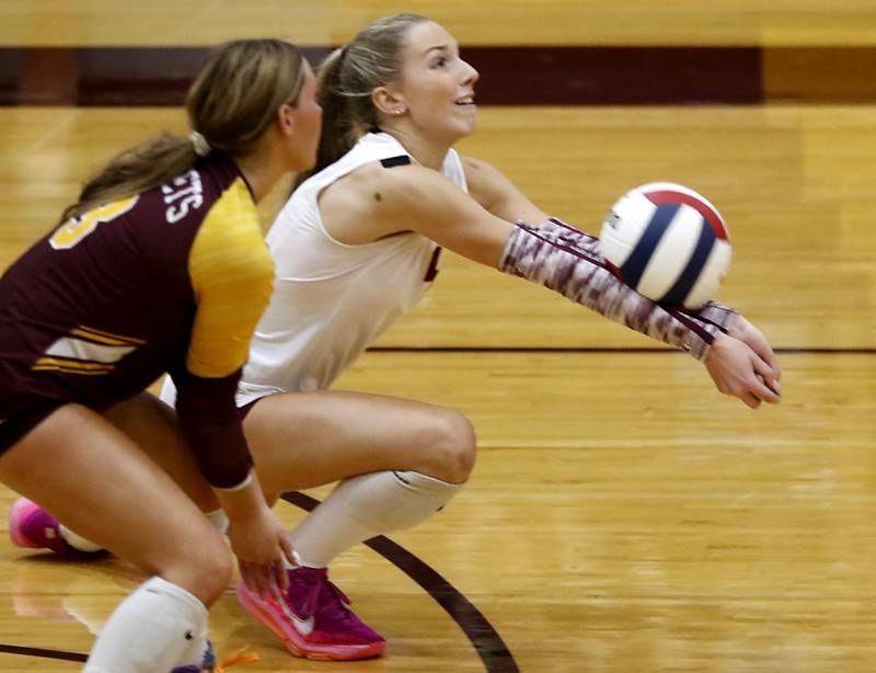 Richmond-Burton's Daniella Hopp passes the ball forward in front of her teammate, Delanee Cooley, during a nonconference volleyball match against Lakes on Monday, Sept. 29, 2025, at the Richmond-Burton High School in Richmond.