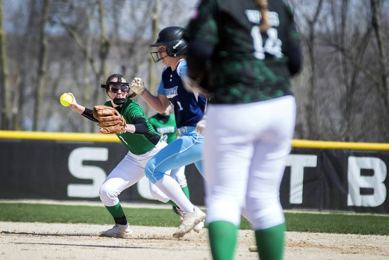 Rock Falls' Rylee Johnson throws to first for an out Saturday, April 16, 2022 against Bureau Valley.