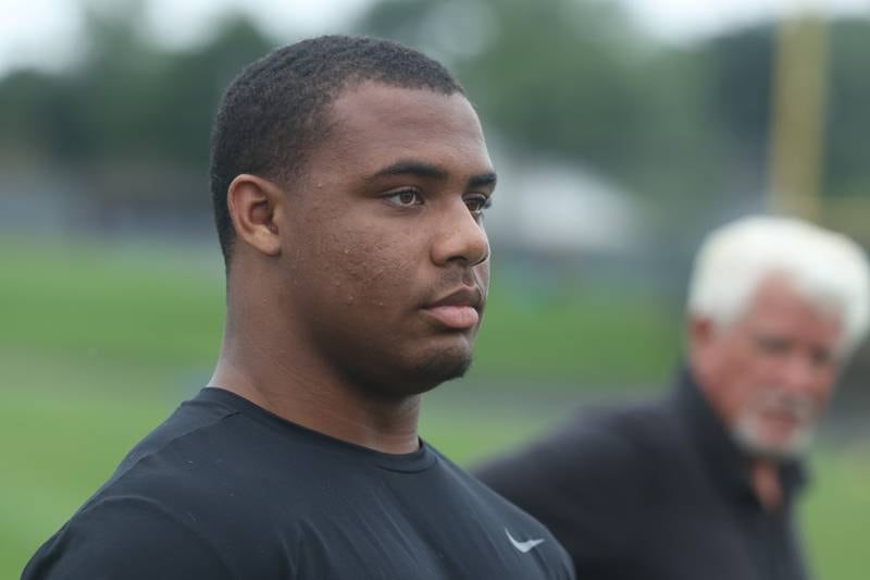 Joliet Catholic’s Dillan Johnson is one of 4 starting defensive linemen to return for the Hilltoppers. Monday, Aug. 8, 2022, in Joliet.