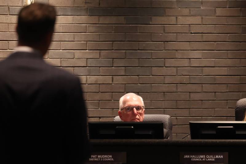 Council Member Pat Mudron listens to Inspector General Sean Connolly speak on the conspiracy allegations against Joliet Mayor Bob O’DeKirk during the City Council Meeting at City Hall in Joliet on Monday, March 13th, 2023.