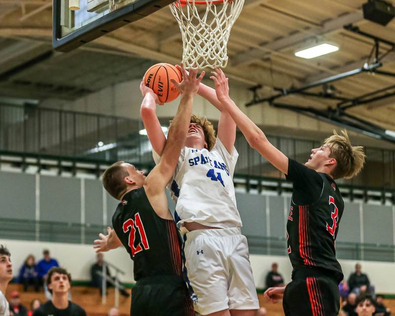 St Francis Ben Whorlow (44) goes back up after grabbing a rebound during their Jack Tosh Holiday Classic basketball tournament game between St Francis at Yorkville Thursday Dec 26, 2024 in Elmhurst.