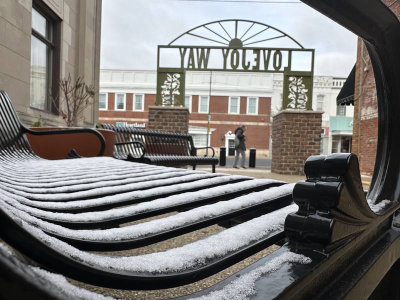 A thin layer of snow covers a park bench on Thursday, Nov. 21, 2024 at Lovejoy Way in Princeton.