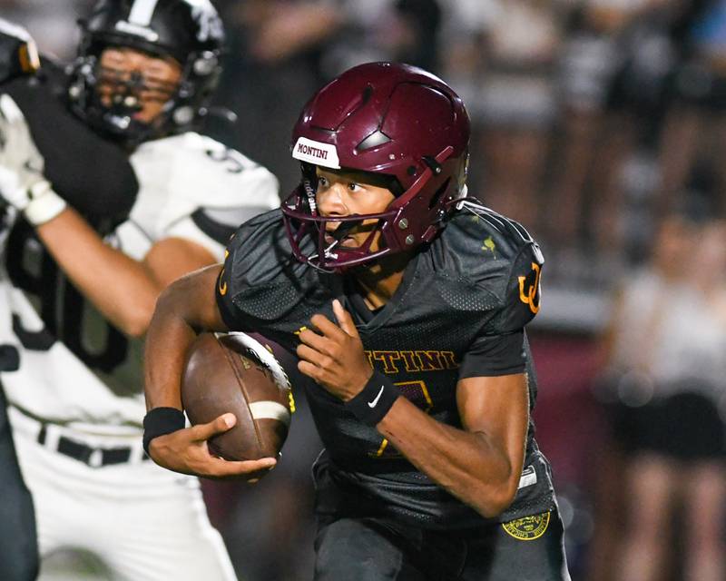 Montini Catholic’s Israel Abrams (7) runs the ball during the game against Fenwick on Friday Sept. 19, 2025, held at Montini Catholic High School.
