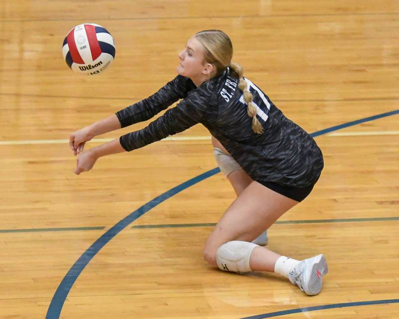 St. Francis's Addi Samolinski (17) bumps the ball during the game on Wednesday Oct. 2, 2024, while taking on St. Charles North on their home court at St. Francis High School in Wheaton.