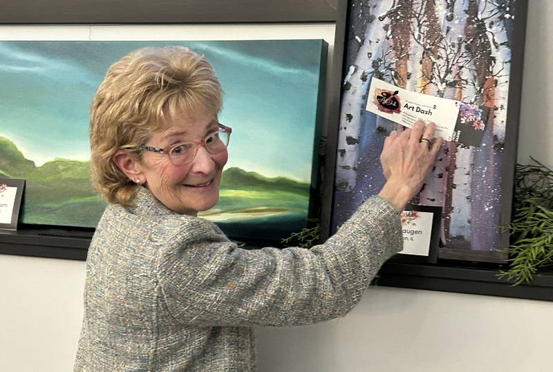 Cindy Byrd of Polo chose Diane Huagen's "Rainbow Birch Trees" oil on canvas at Serenity Hospice and Home’s Fourth Annual Art Dash fundraiser on Wednesday, April 9, 2025, at River’s Edge Experience, 103 S. First St., Oregon.
