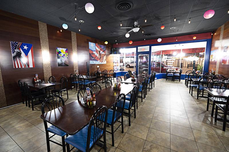 The dining room is decorated to pay respects to the family’s Puerto Rican roots.