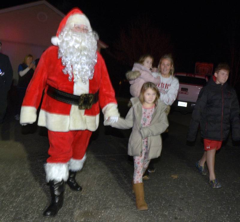 Santa takes the  Thompson family for a walk to see the Spring Valley Fire Dept. truck