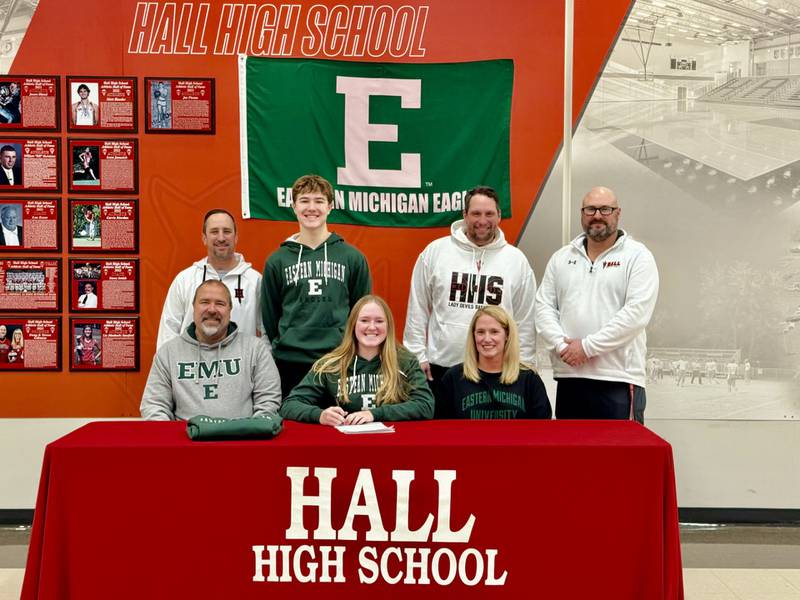 Hall senior Ella Sterling had her signing to join the women's rowing team at Eastern Michigan University on Monday at Hall High School. She was joined by her parents (front row) Nick and Jyll Sterling; and Hall assistant girls basketball coach Mark Mautino, her brother Chace Sterling, Hall head girls basketball coach TJ Orlandi and Hall athletic director Eric Bryant.