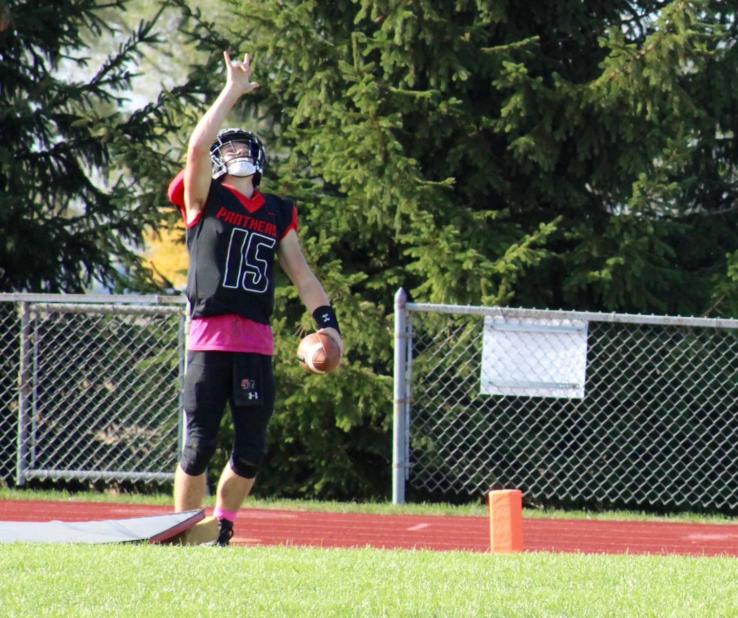 Mason Misfeldt (15) signals his touchdown   which came on a broken play in the second quarter. Misfeldt caught a pass from quarterback Kolby Franks, was hit and dropped the ball, went back and scooped up the fumble, then went on a breakaway run for the sidelines, completing the 37-yard scoring play.