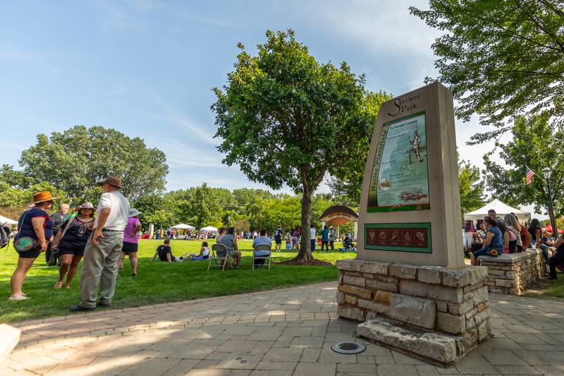 Barro Fest attendees enjoy a beautiful day at Settlers' Park in Plainfield on July 27, 2024.