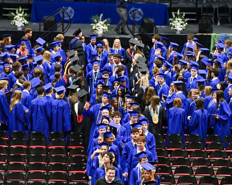 St. Charles North graduates exit the ceremony on Monday, May 18, 2026, held at the NIU Convocation Center in DeKalb.