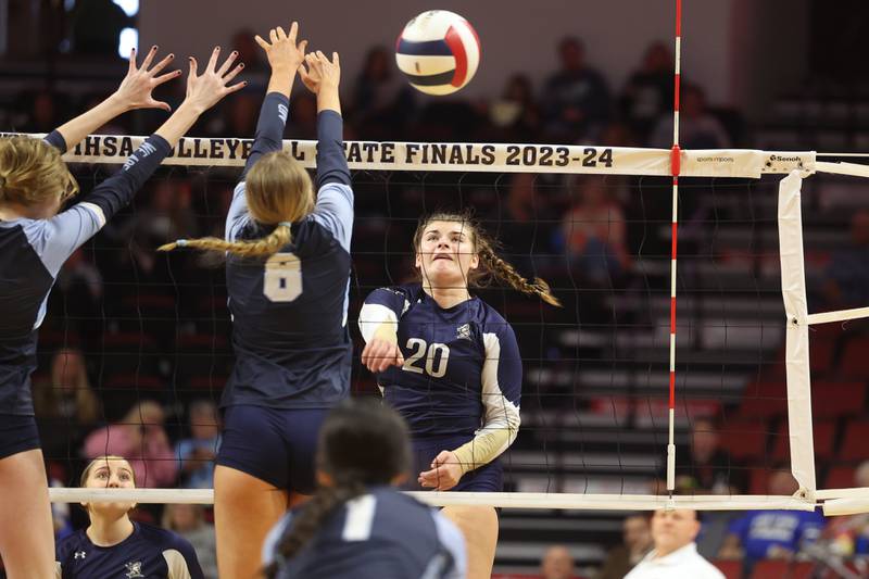 IC Catholic’s Emily Carling hits a shot against Mater Dei in the Class 2A Volleyball Championship match on Saturday, Nov. 11, 2023 in Normal.