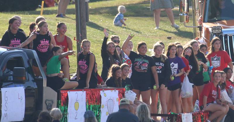 L-P girls tennis players ride in a float during the L-P Homecoming parade on Thursday, Sept. 26, 2024 near the corner of 7th Street and Orleans Street in Peru.