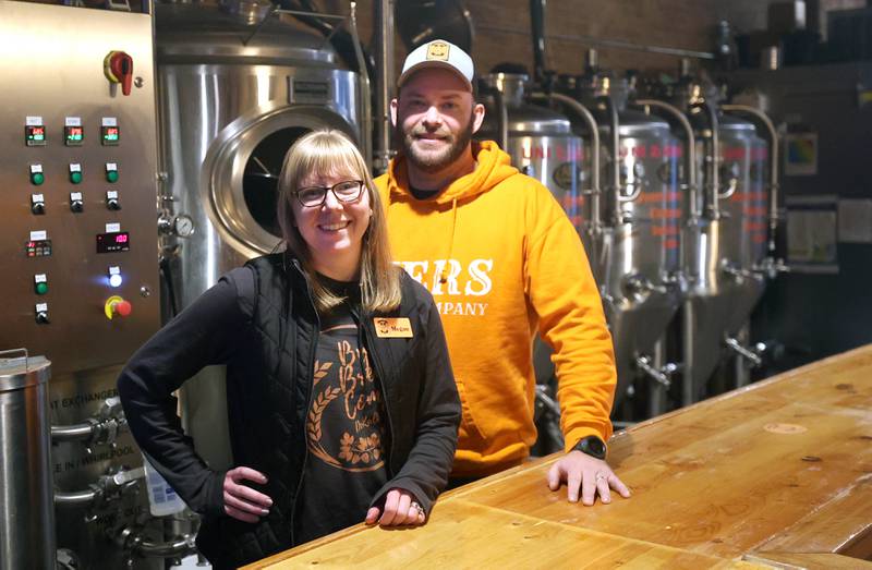 Steve and Megan Byers, co-owners of Byers Brewing Company, in the brewing area Friday, Jan. 6, 2023, at the brewery and taproom in DeKalb. Byers is planning an expansion of its operations to include another location,  216 N. Sixth St., in DeKalb for production only.