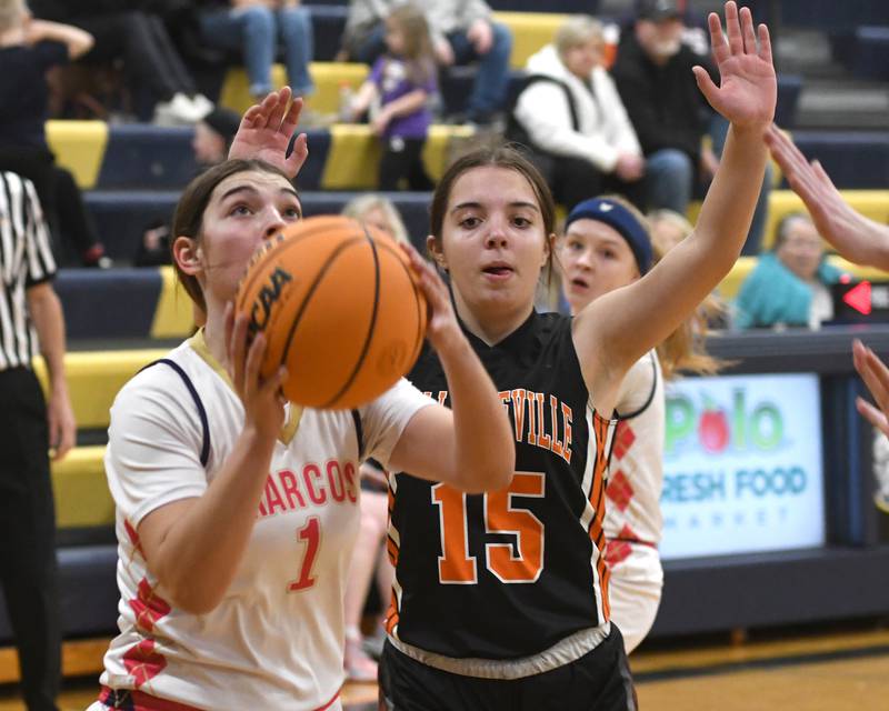 Polo's Elsa Monaco (1) shoots as Milledgeville's Sophia Armstrong (15) defends on Saturday, Jan. 24, 2026 at Polo High School.