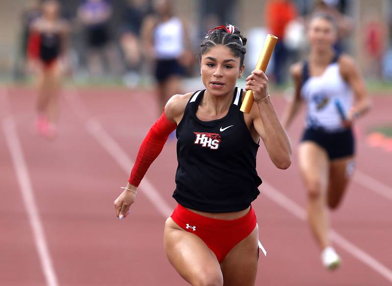 Huntley’s Victoria Evtimov races tot eh finish line to win 4 x100 meter relay during the Huntley IHSA Class 3A Girls Sectional Track and Field Meet on Wednesday, May 8, 2024, at Huntley High School.