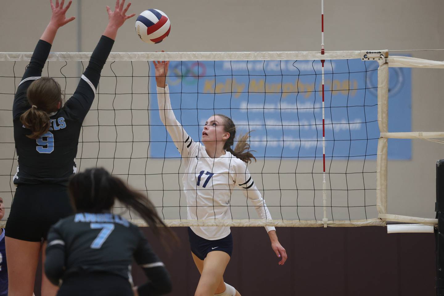Nazareth’s Lauren Salata pushes over a shot against Joliet Catholic on Tuesday, October 11th in Joliet.