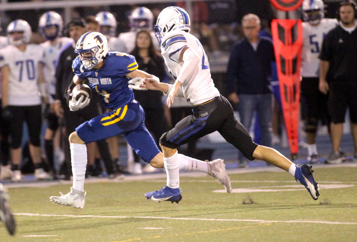 Wheaton North’s Rich Schilling runs the ball during a game against St. Charles North in Wheaton on Friday, Sept. 8, 2023.