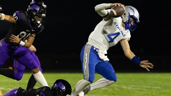 Woodstock gets late stop to hold off Plano 20-14