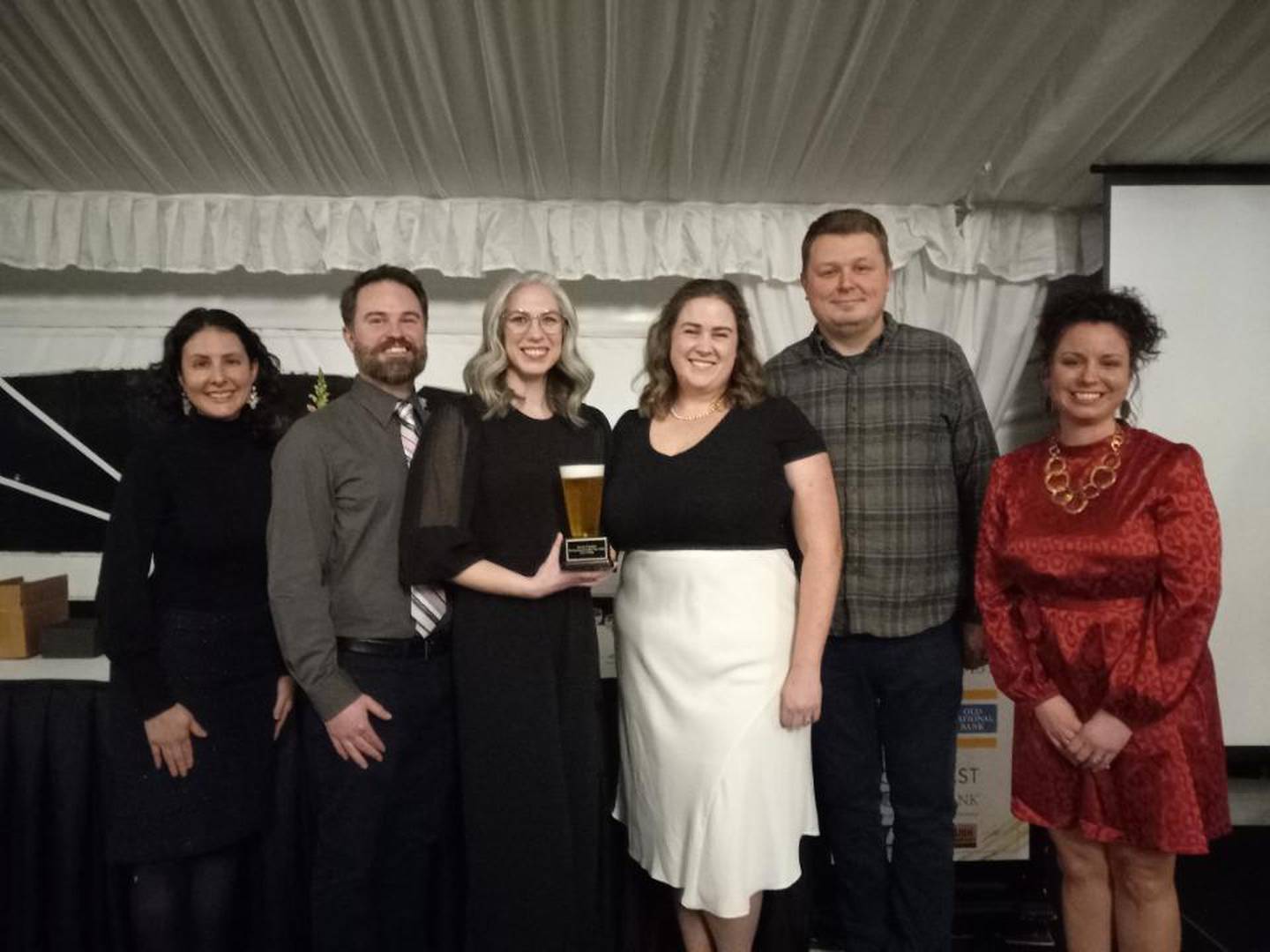 Maggie and Eric Schutz and Christen and Colt Snodgrass of Iron & Glass were honored with the Entrepreneurs of the Year Award at the Grundy Economic Development Council and the Grundy County Chamber of Commerce & Industry’s Annual Dinner on Wednesday night.
