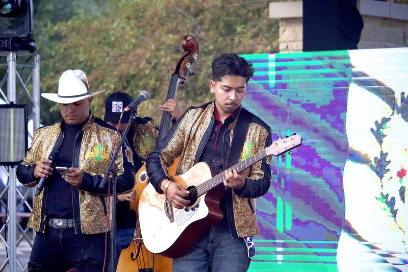 A member of Alta Jerarquia plays guitar at Fiesta en el Bicentennial Park at Saturday, Sept. 14, 2024 at Billie Limacher Bicentennial Park in Joliet.