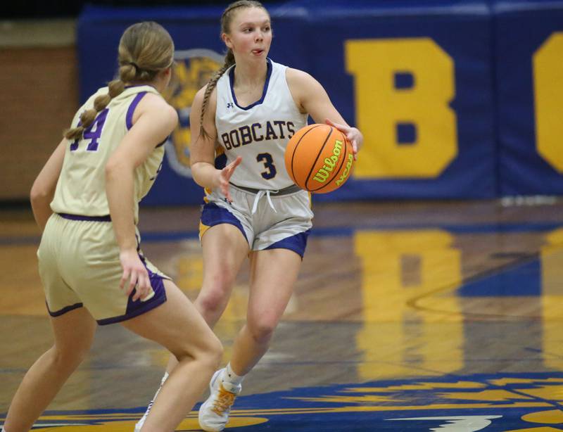 Somonauk/Leland's Macey Kinney looks to pass the ball off as Serena's Macy Mahler defends on Monday, Feb. 10, 2025 at Somonauk High School.