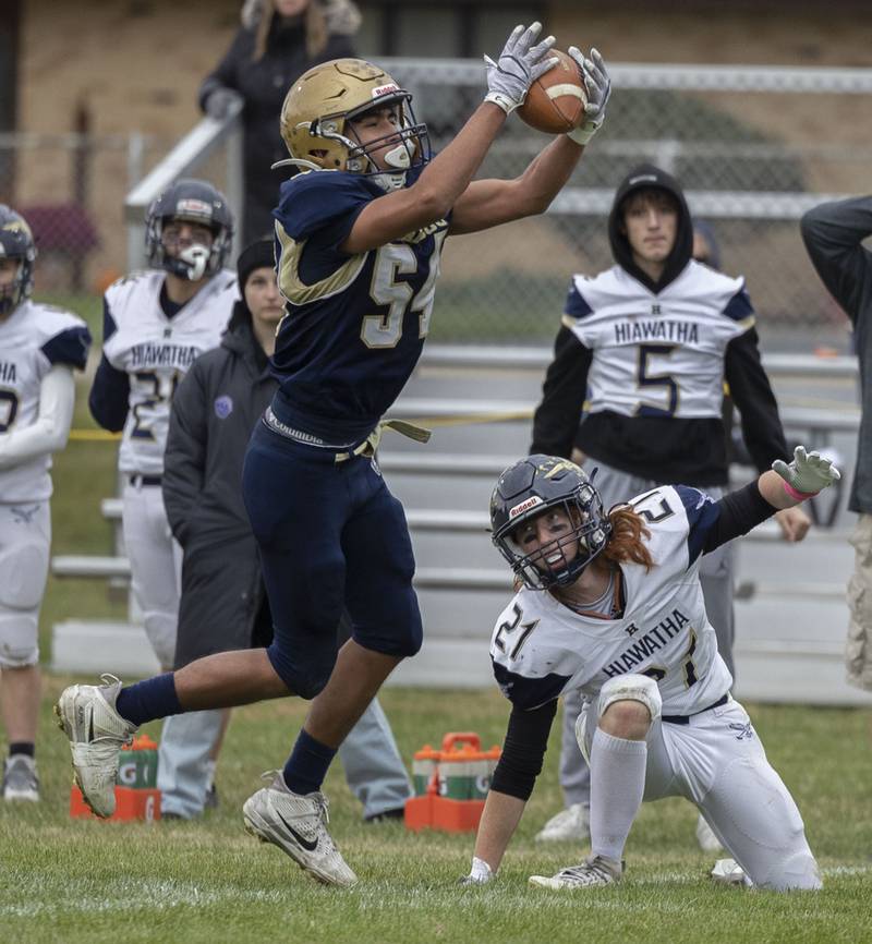 Polo’s Esteban Salinas hauls in an interception against Hiawatha Saturday, Nov. 1, 2025, in the 8-man football playoff quarterfinals.