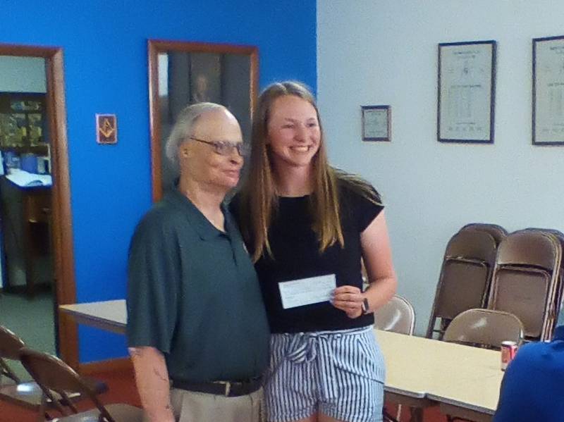 The Walnut Masonic Lodge #722 presented a $1,000 scholarship check to Bureau Valley High School Graduate Kyra Stoller during a dinner in her honor.