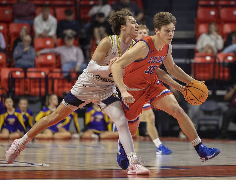 Eastland’s Parker Krogman has the ball knocked away by Peoria Christian’s Gavin Wilder Thursday, March 13, 2025, during the Class 1A boys basketball state semifinal.
