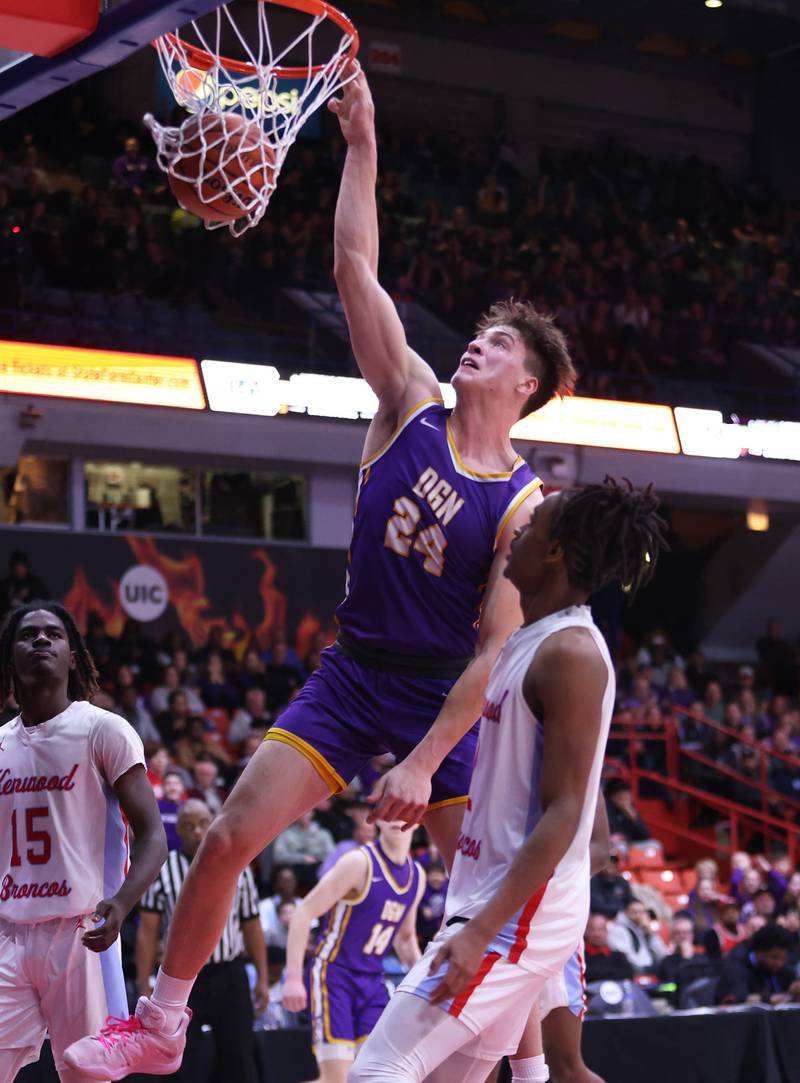 Downers Grove North's George Wolkow (24) throws down a dunk during the boys 4A super-sectional game between Kenwood Academy and Downers Grove North high school in Chicago on Monday, March 6, 2023.