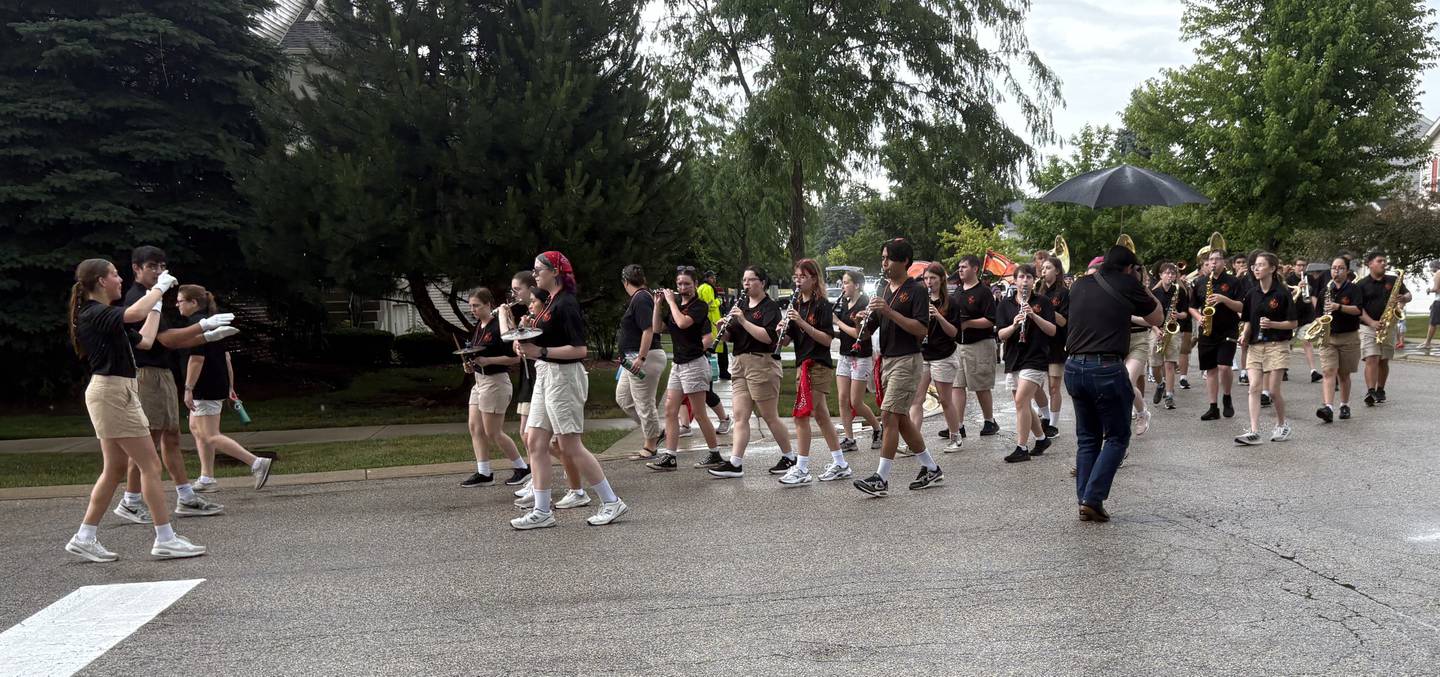The McHenry High School Marching Warriors participate in the Lakemoor Fourth of July parade July 4, 2025.