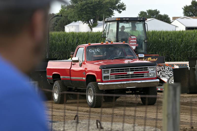 A truck driver hooks up the sled for a run Thursday, July 24, 2025, at the Lee County Fair’s truck and tractor pulls in Amboy.