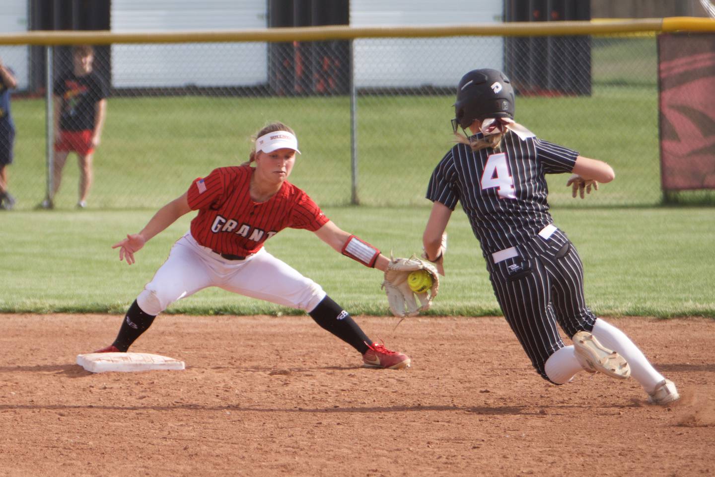Grant's Sofia DeAngelis gets the out at second base as Huntley's Clara Hudgens is out on the play at the Class 4A Sectional Semifinal on June 1, 2022 in Huntley.