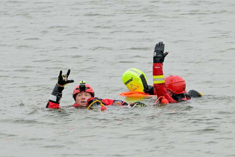 Fox River & Countryside firefighters perform a demonstration water rescue of during the Campton Hills National Night Out on Tuesday, August 6, 2024.