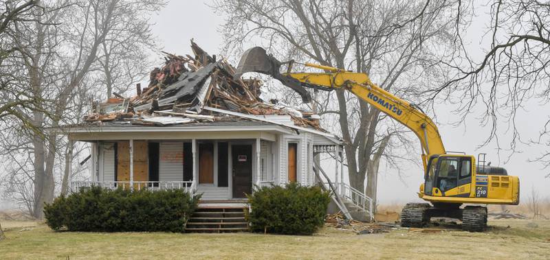 The Peck farm house at 64 Peck Road in Geneva is demolished on Wednesday, March 22, 2023.