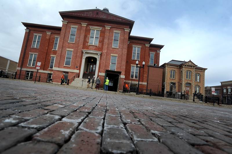 The Old Courthouse and Sheriff’s House is photographed Tuesday, March 1, 2022, in Woodstock. The renovation of the courthouse has started, with construction and demolition underway.