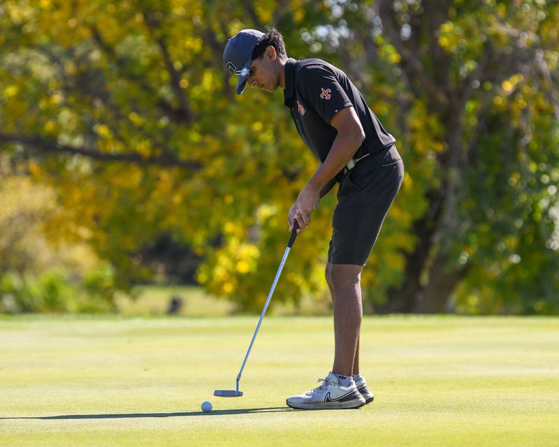 St. Charles East's Arnav Patel putts on Monday Oct. 7, 2024, during the 3A sectional match held at Blackberry Oaks Golf Course in Bristol.