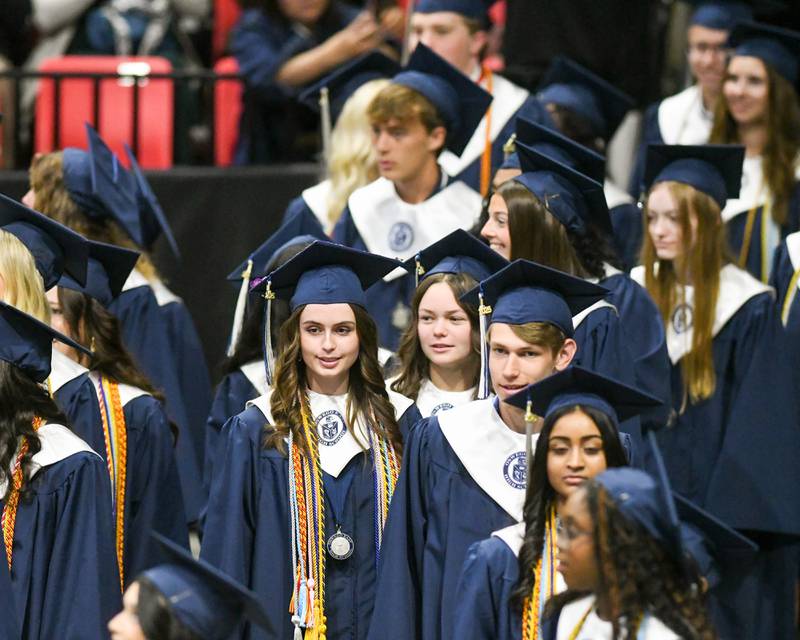 Oswego East graduates make their way into the commencement ceremony on Saturday May 17, 2025, held at the Convocation Center in DeKalb.