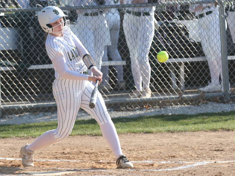 St. Bede's Maci Kelly hits a home run against Midland on Thursday, March 21, 2024 at St. Bede Academy.